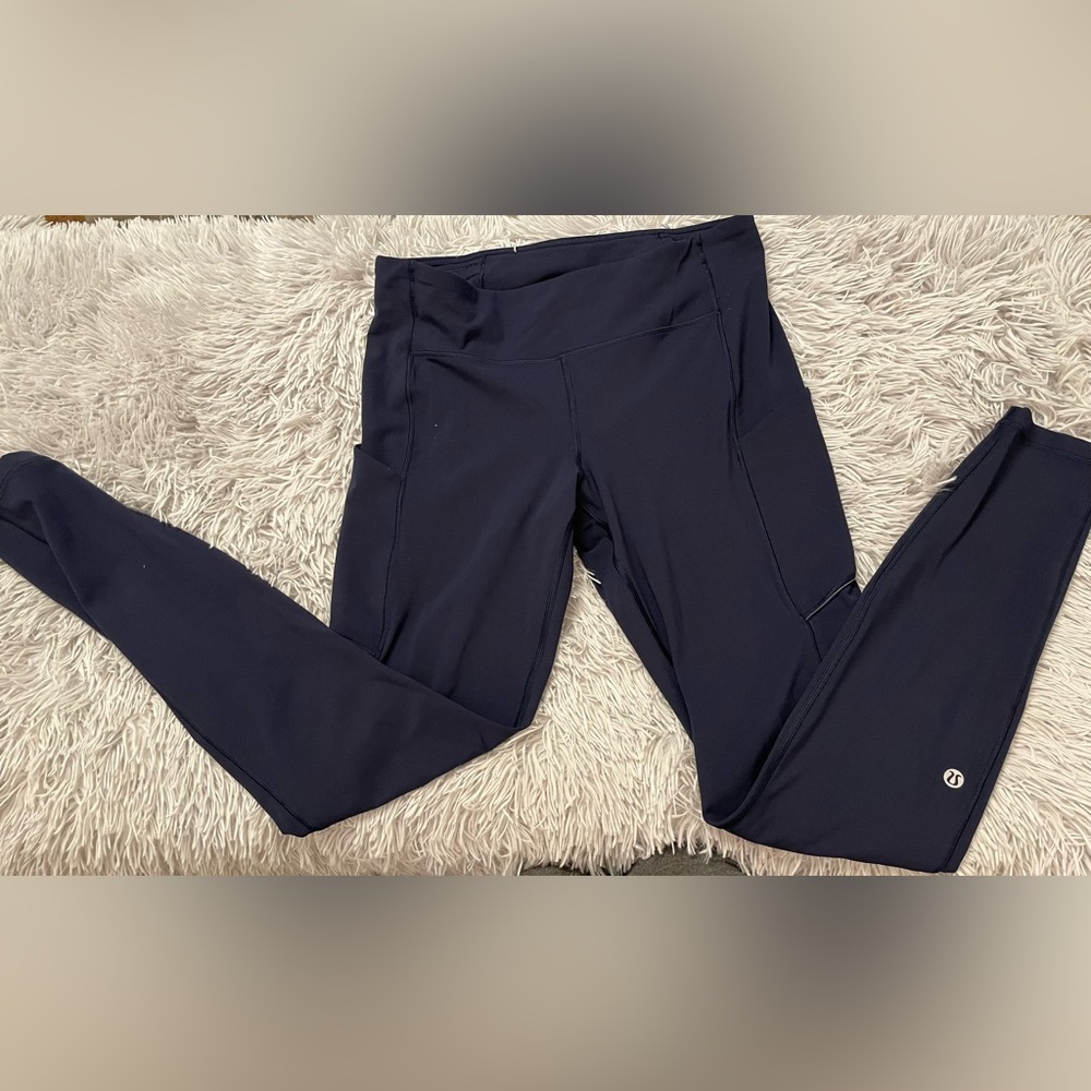 Lulu lemon navy yoga pants with pockets. Size 8.